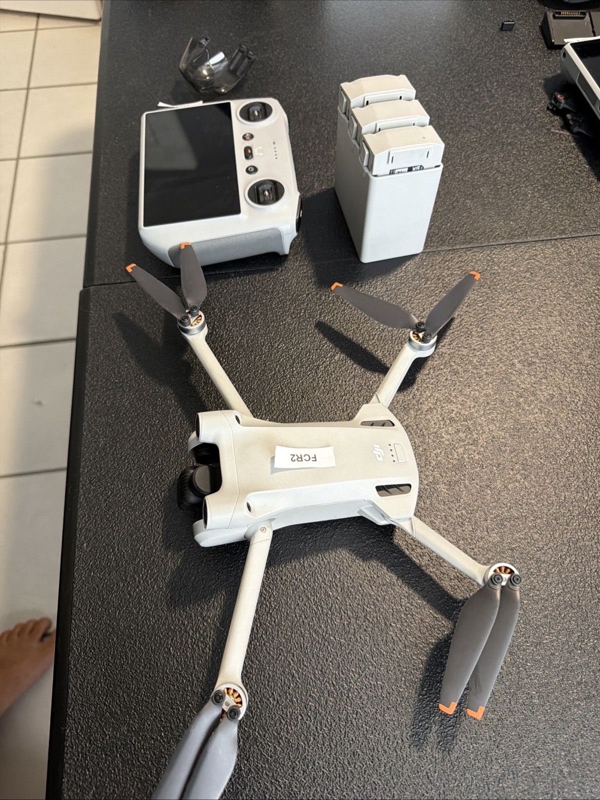 DJI Mini 3 Pro Camera Drone (with RC Remote) + 3 Batteries