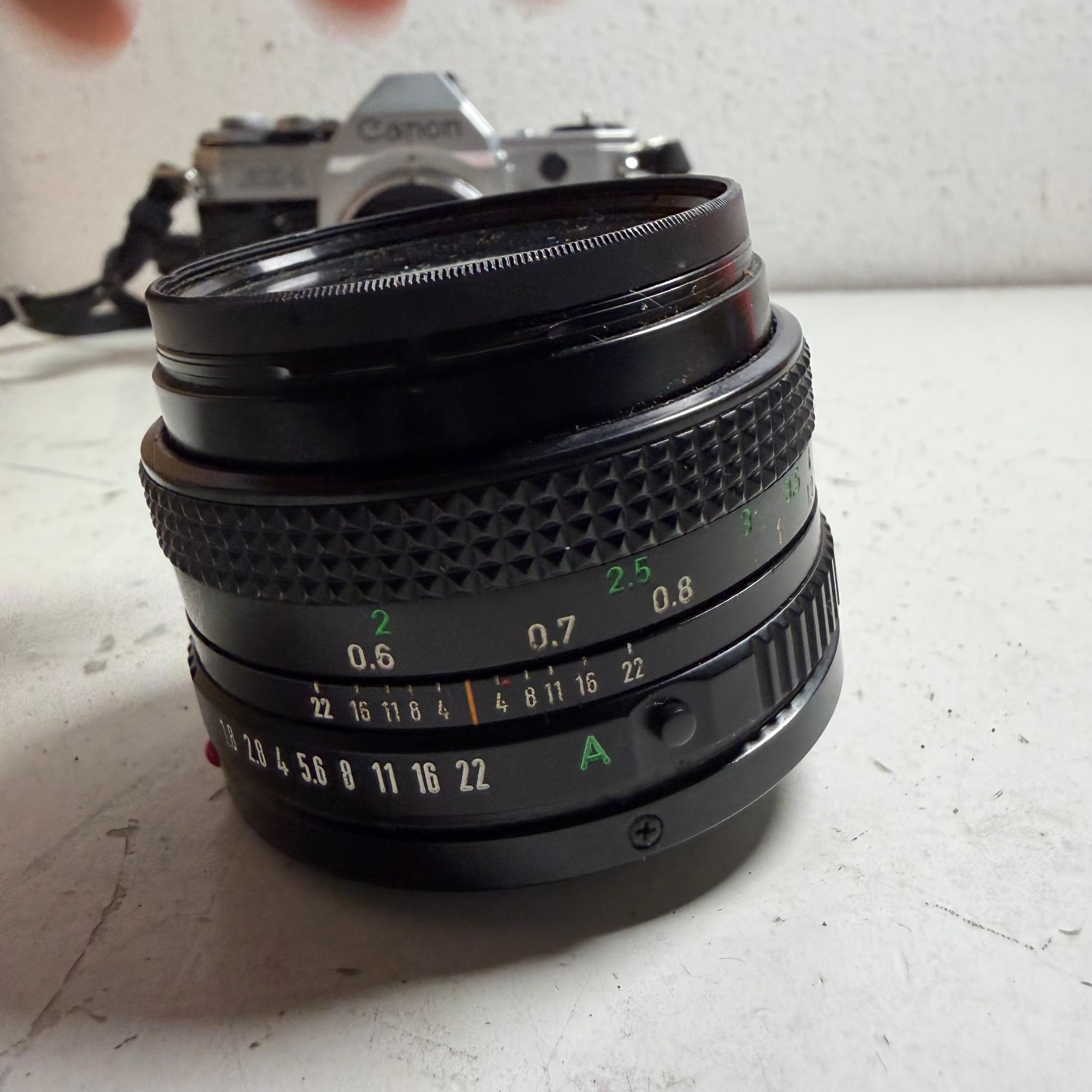 Canon AE-1 Black 35mm SLR Film Camera with Canon FD 50mm f/1.8 Prime Lens