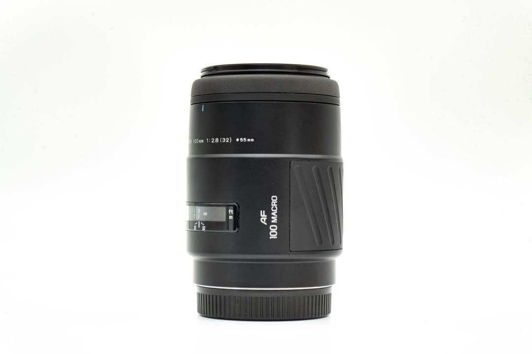 1-Month Warranty. Minolta 100 F2.8 Macro Lens. Functionality Checked.