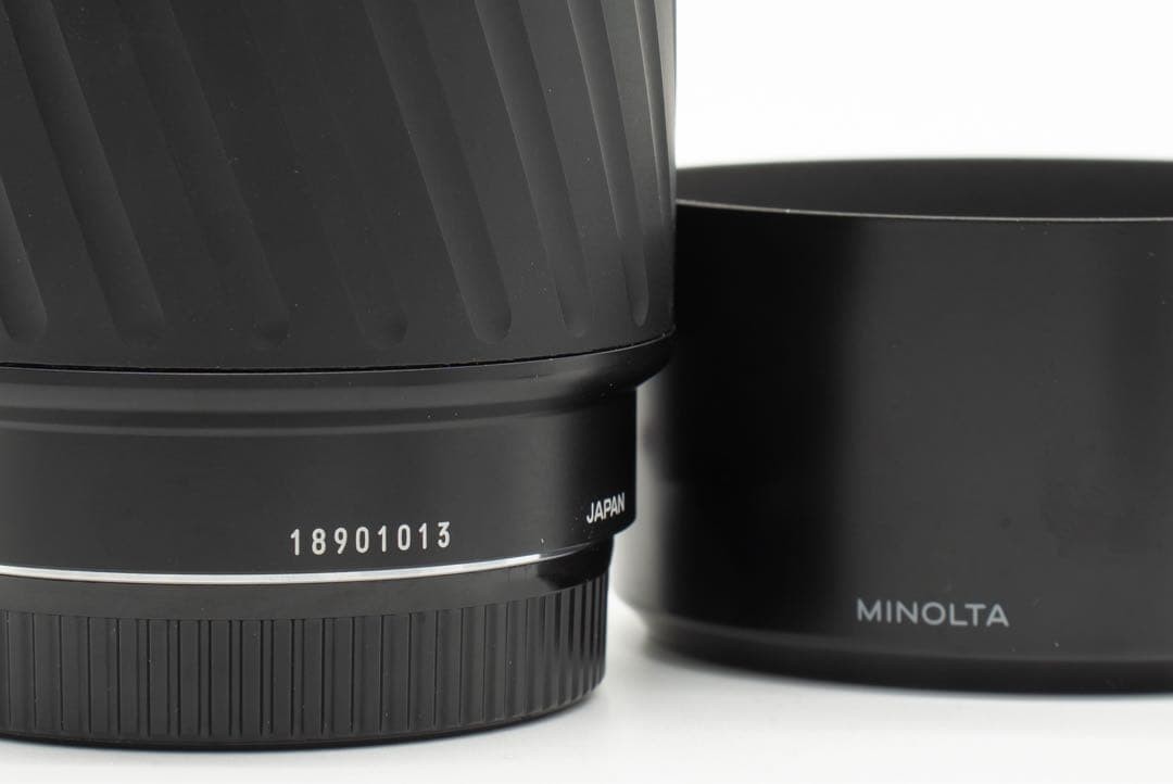 1-Month Warranty. Minolta 100 F2.8 Macro Lens. Functionality Checked.