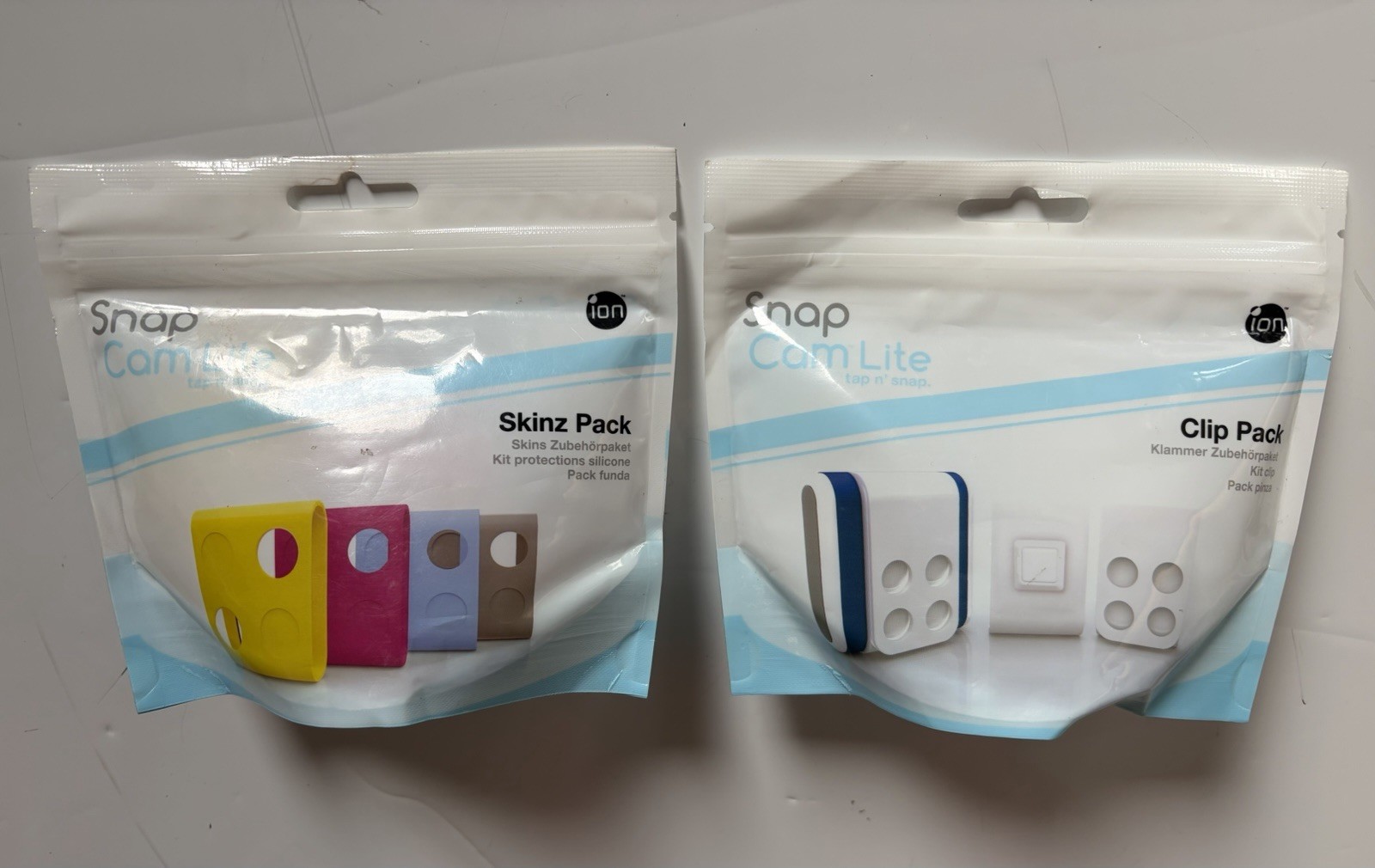 LOT OF 2 ion Snap Cam Lite tap n’ Snap Clip & Skinz Pack Only – no Camera