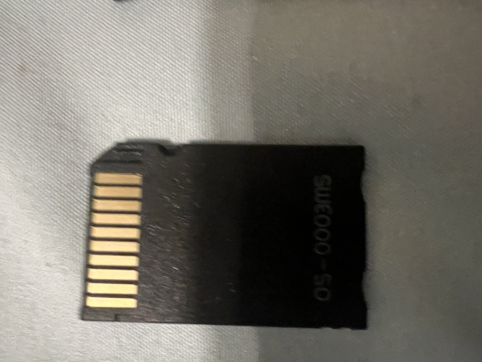 SanDisk 1GB PRO Duo & Sony 32MB Duo MagicGate for PSP + microSD Adapter
