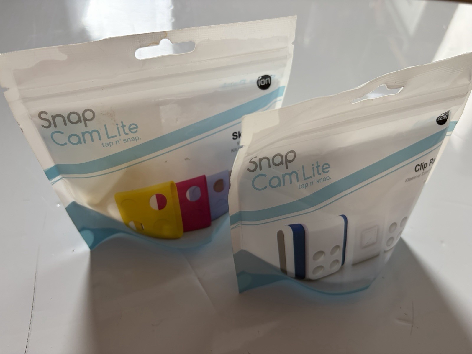 LOT OF 2 ion Snap Cam Lite tap n’ Snap Clip & Skinz Pack Only – no Camera