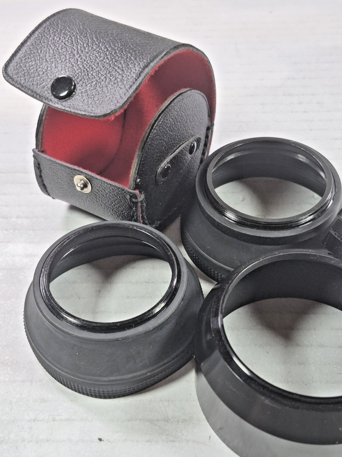 Miscellaneous used camera lens, filters, and empty cases plus misc. others
