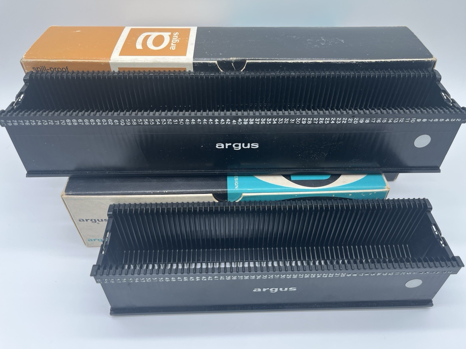 Vintage Argus magazine slide Spill Proof 2-80 capacity and 2-60 capacity