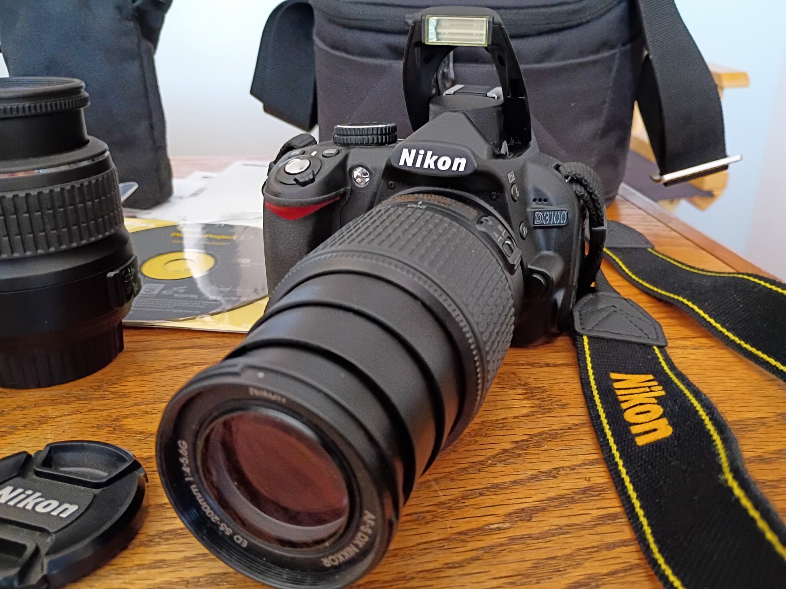 Nikon D3100, 18-55mm, 55-200mm Lenses, 32GB SD, Case, Charger, Manuals, Tested