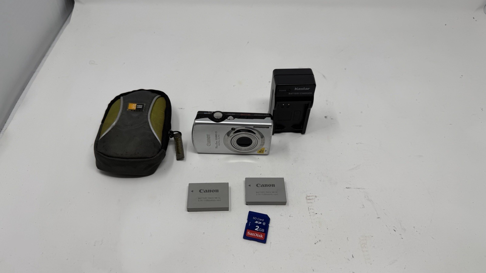 Canon PowerShot SD 880 IS ELPH 10.0MP 4x Camera – Silver Tested W/ 2 Batteries