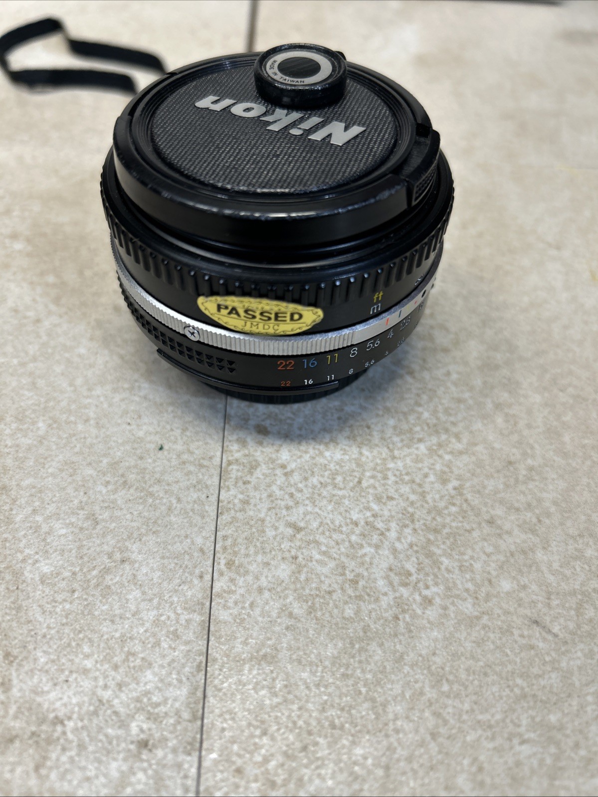 Nikon Nikkor 50mm F1-1.8 lens W/lanyard Made In JAPAN