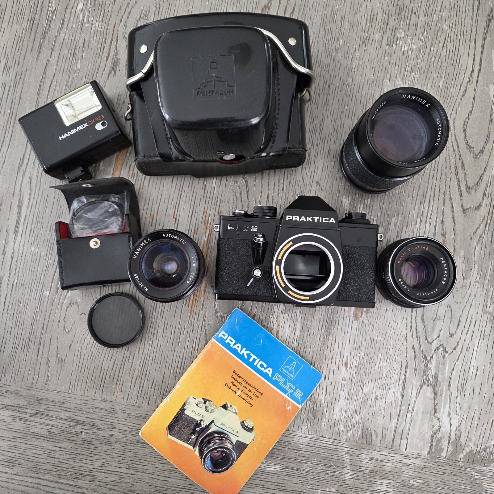 PRAKTICA PLC2 Black 35mm SLR Camera w/ 50mm f/1.8, 135mm f/2.8 & Flash