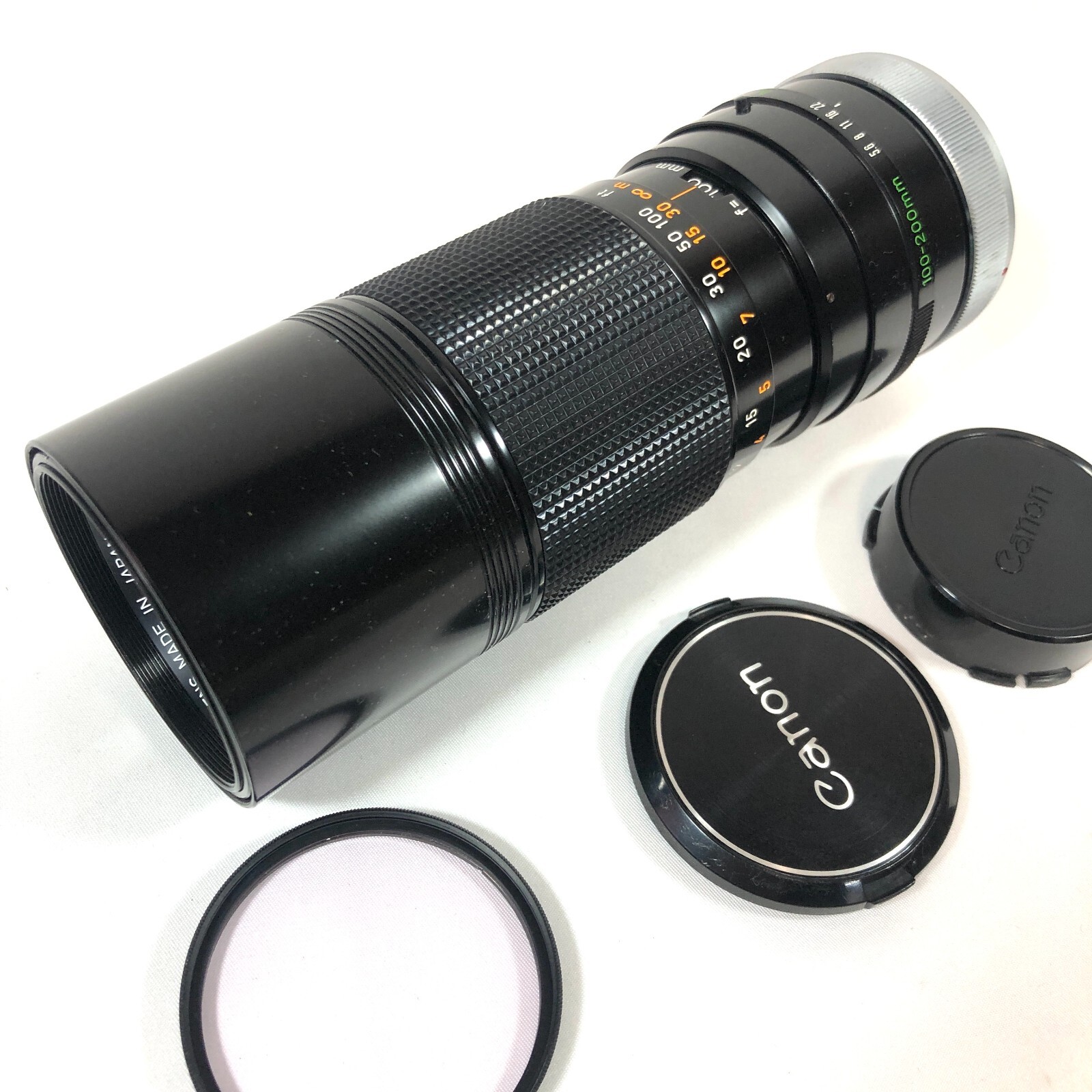 CANON FD 100-200mm f/5.6 SC ZOOM LENS Made in Japan Mold: None Fog: None