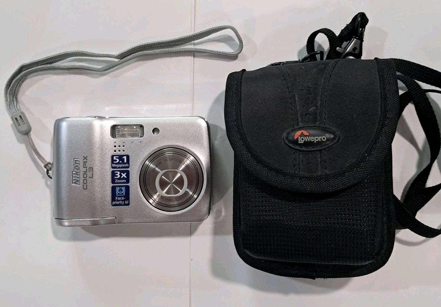 Nikon Coolpix L3 5.1MP Digital Camera Silver w/ Wrist Strap & Lowepro Case