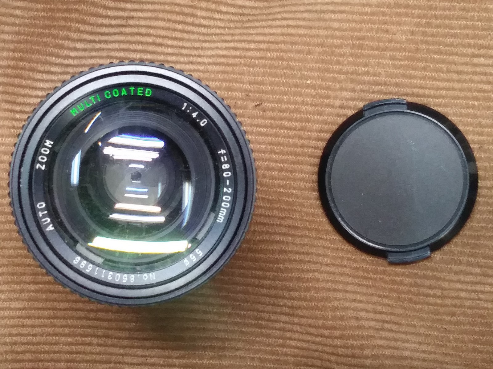 The Vintage Starblitz Auto Zoom 28-80mm f=3.5-4.5 Lens with a Konica “AR” mount