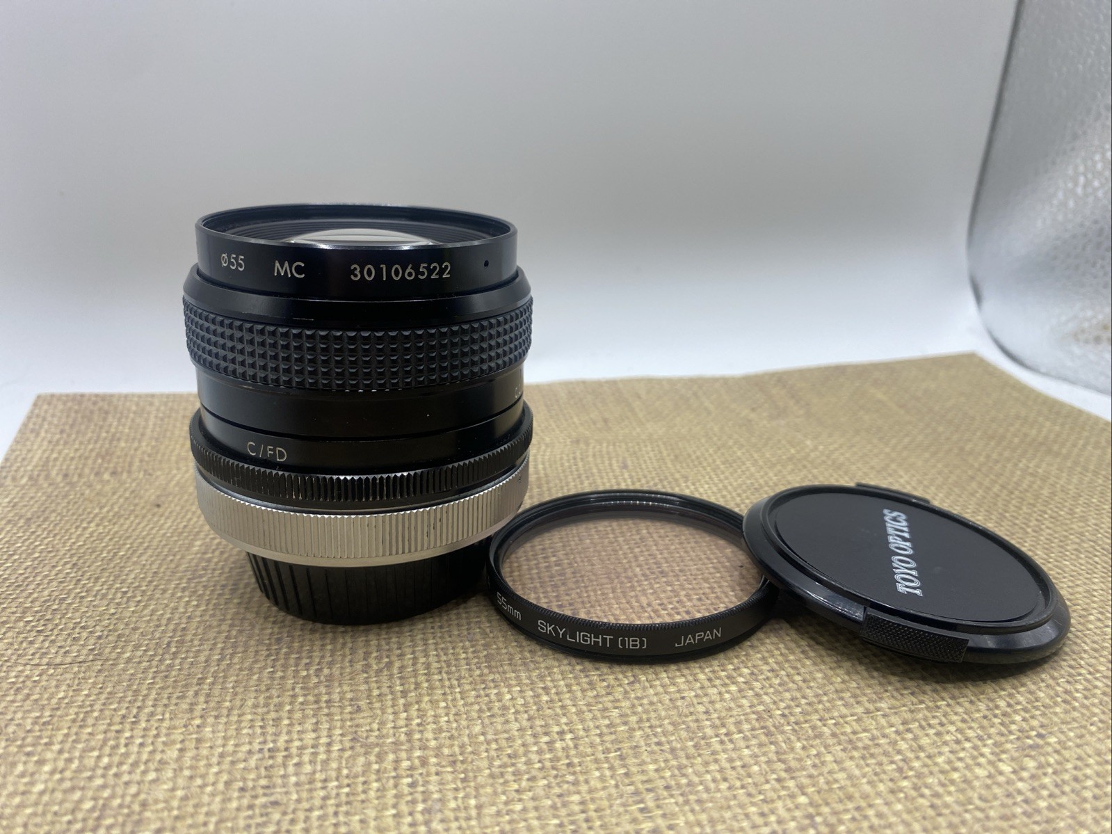 Kiron 28mm f2 Nikon Ai mount #30106522 + Hoya 55mm Skylight 1B Filter