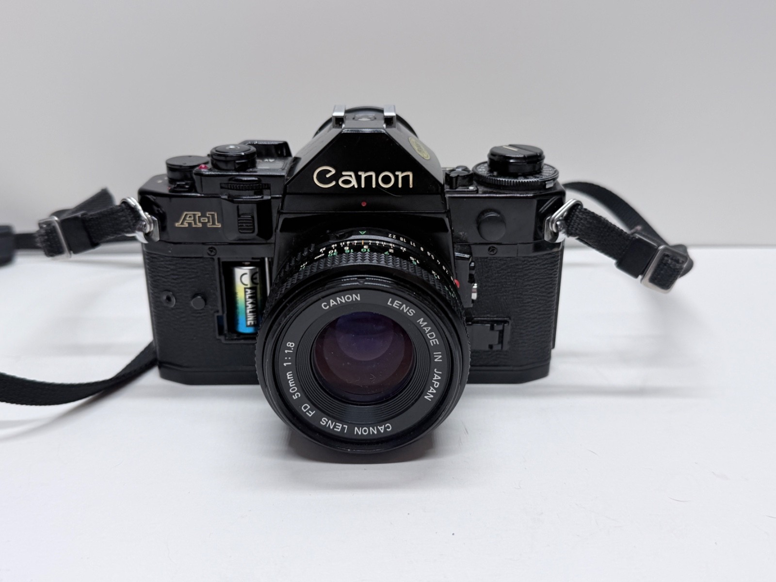 Canon A-1 35mm SLR Film Camera with 50mm F1.8 lens bad battery door