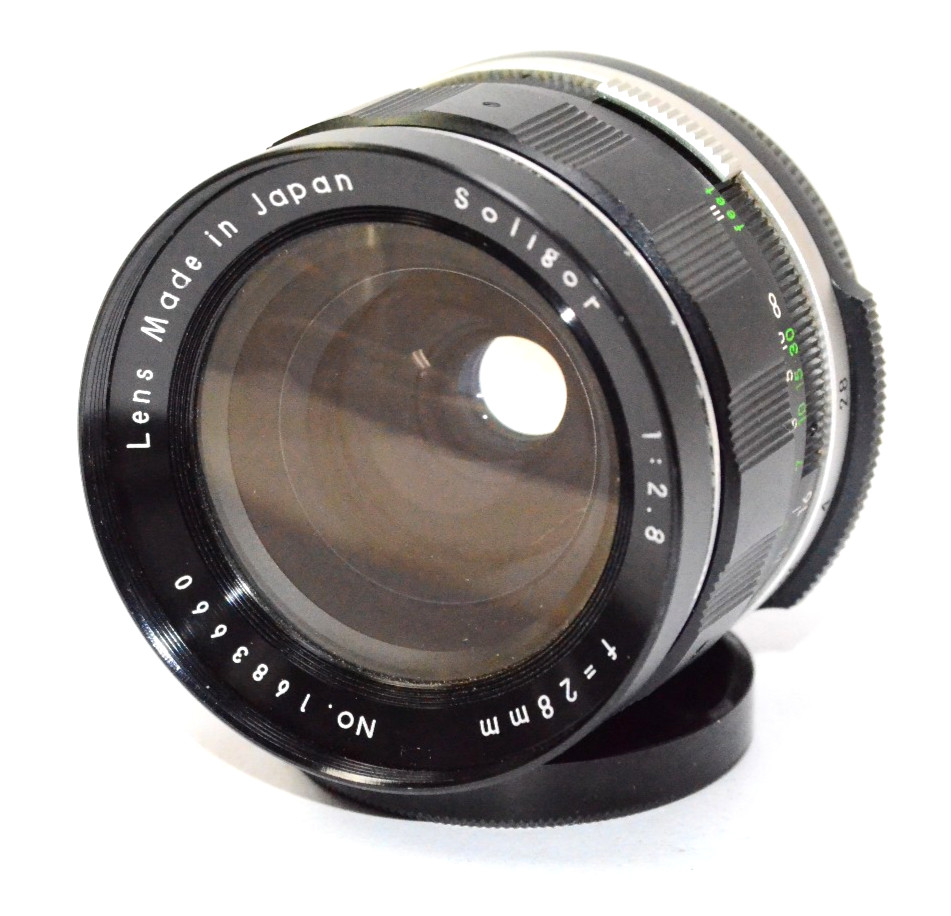 Soligor 28mm F/2.8 Manual Focus Lens T Mount w/ T to Pentax Screw Mount.